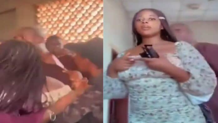 WATCH Female university student slaps, bites and beats her lecturer for interrupting her TikTok video